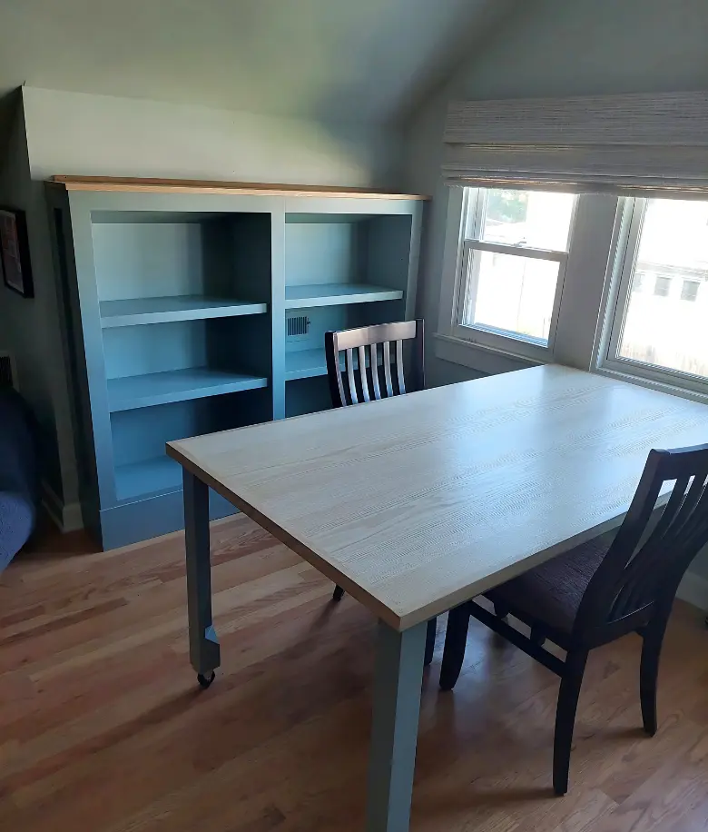 home office with custom shelving and desk by BradleyBuilt