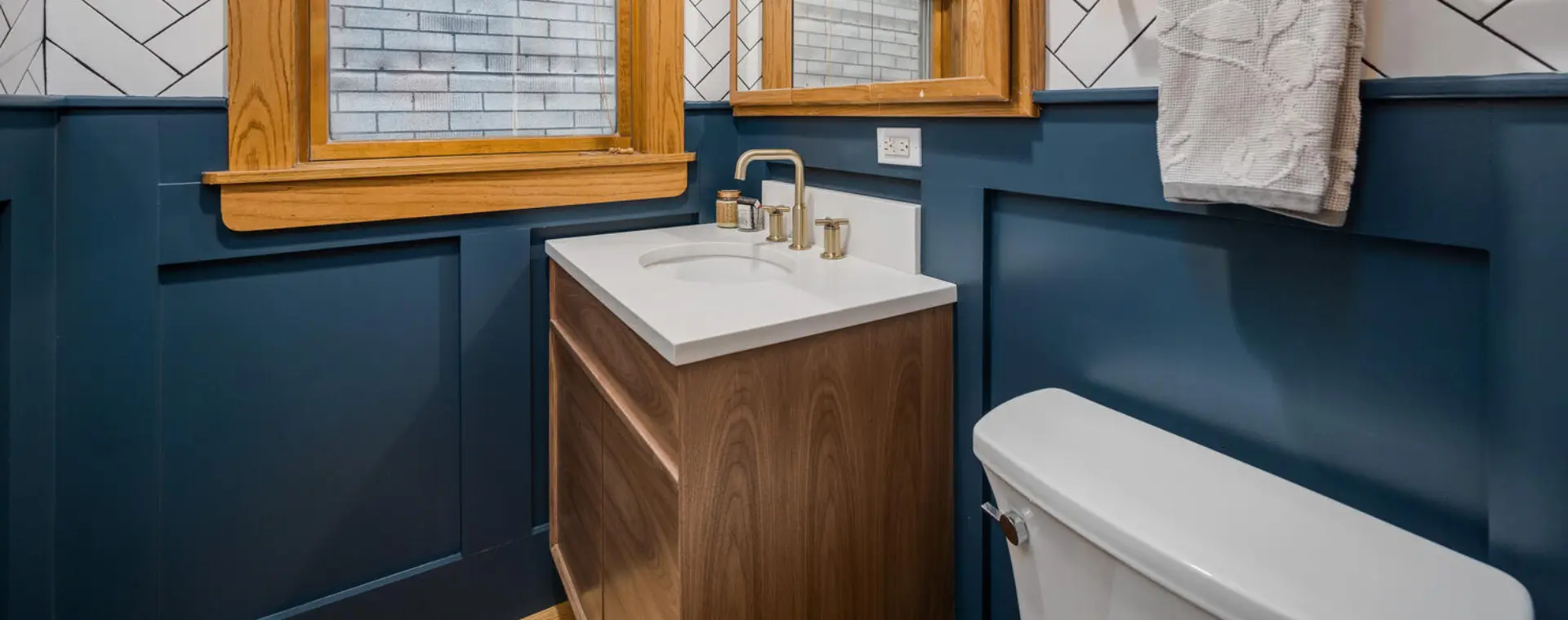 BradleyBuilt custom walnut vanity cabinetry