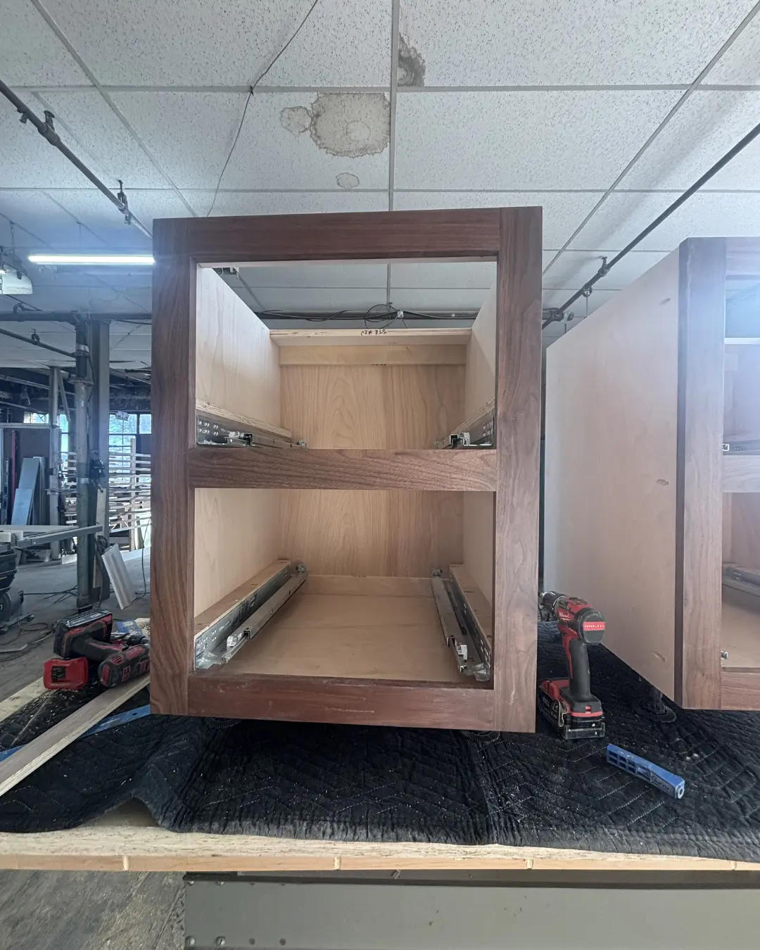 BradleyBuilt custom walnut vanity cabinetry