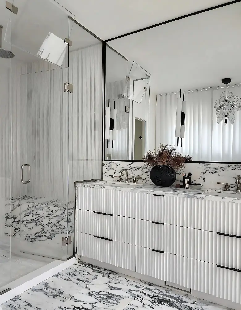 Custom bathroom vanity in Bucktown with fluted cabinet front by BradleyBuilt.