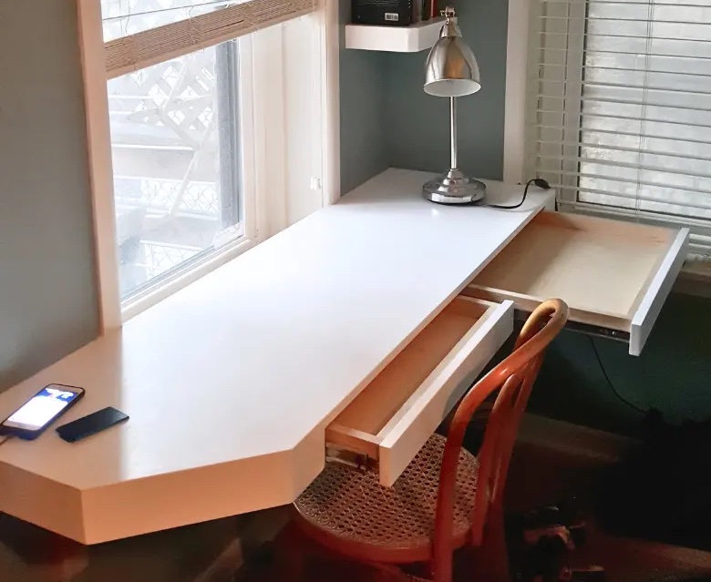 Solid wood painted white office desk and floating shelves by BradleyBuilt