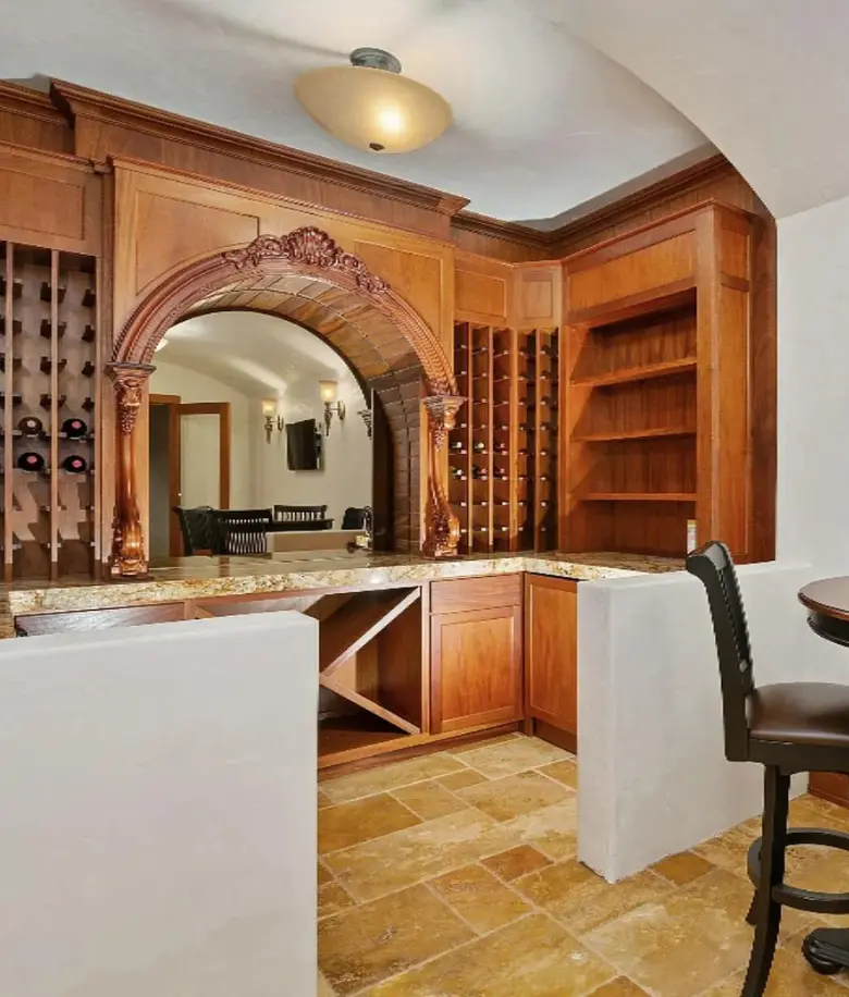 Custom Mahogany wine storage room in New Buffalo, Michigan by BradleyBuilt
